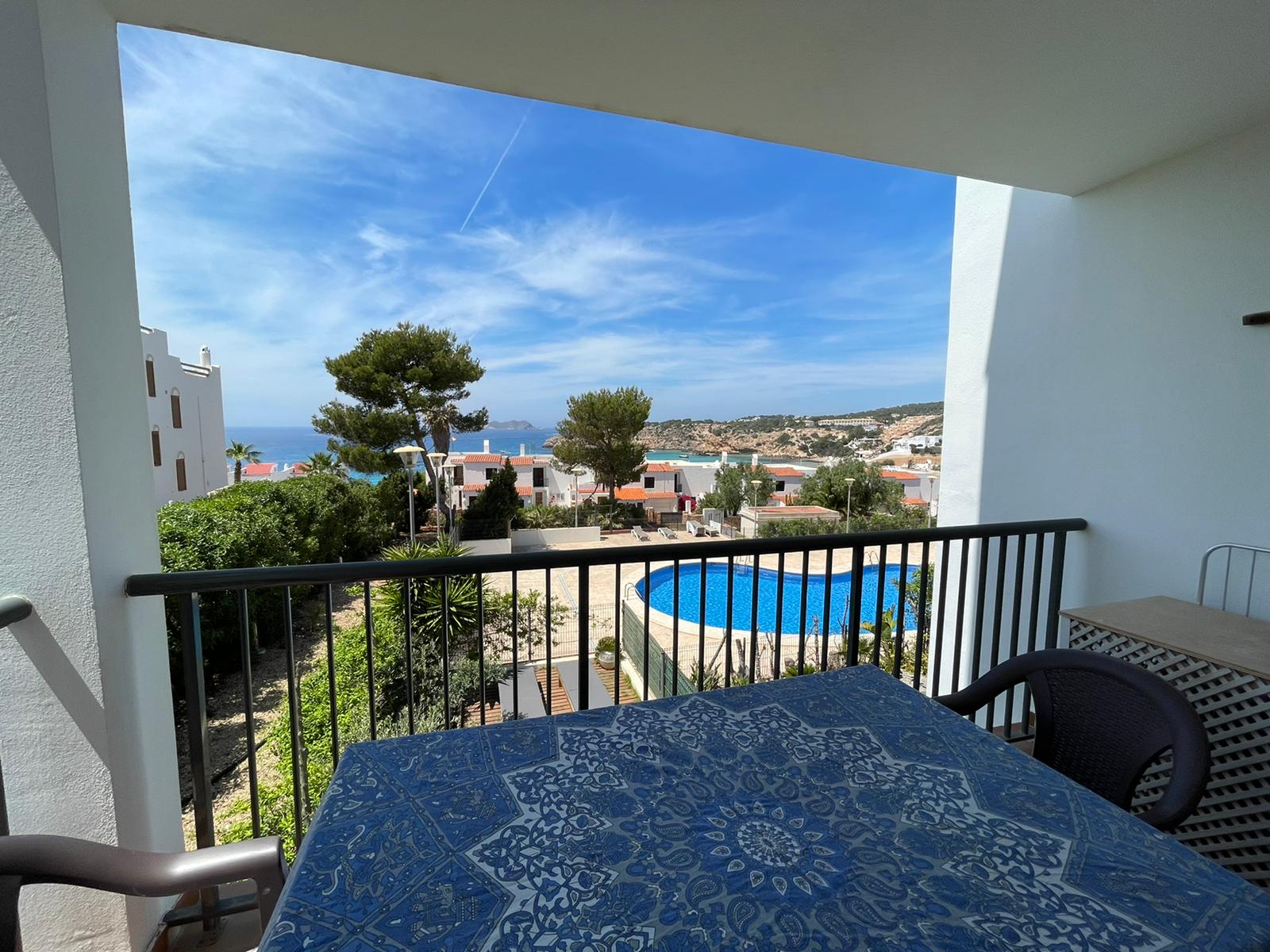 Well maintained apartment in Cala Tarida, right on the beach.